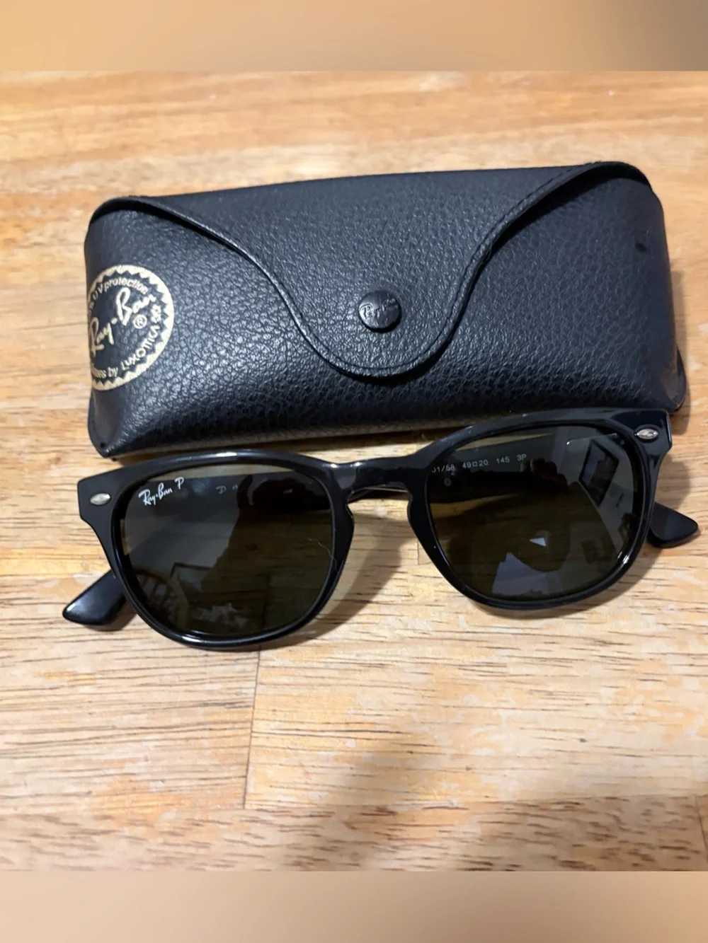 Ray-Ban Black Frame Sunglasses with Green Lenses